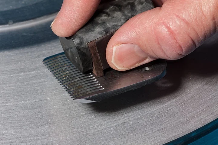 Service d'aiguisage professionnel de lame de clipper